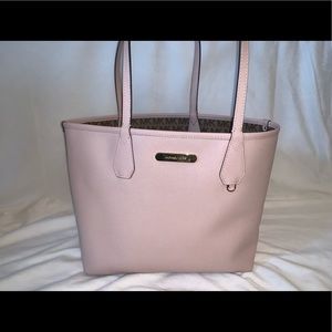 Reversible pink/brown MK purse.